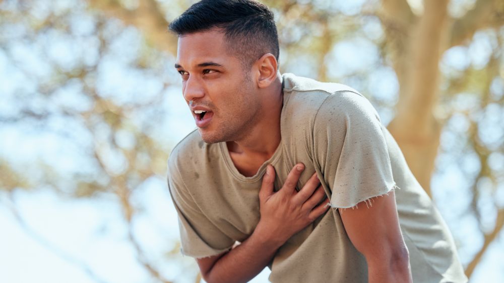 Person experiencing breathlessness or chest tightness